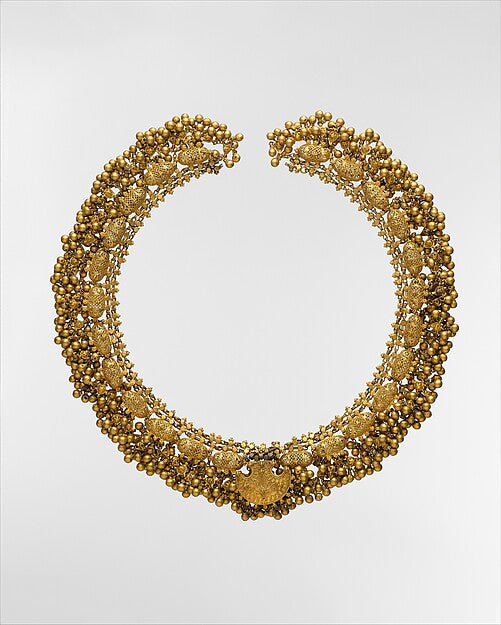 Historic gold necklace with a fan-shaped pendant, filigreed side elements and hanging beads, Metropolitan Museum of Art